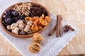 Zimt, dried apricot, nuts, faygi, dates in a wooden cup on a tablecloth Royalty Free Stock Photo