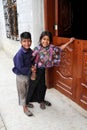 An indigenous Tzotzil Maya girl and boy outside a house in a ZinacantÃÂ¡n near San Cristobal de la Casas, Mexico Royalty Free Stock Photo