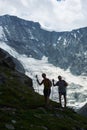 Senior couple hiking in mountains. Royalty Free Stock Photo