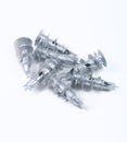 Zinc plated drywall screws on white background