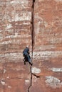 ZION NATIONAL PARK, UTAH/USA - NOVEMBER 4 : Man climbing sheer r