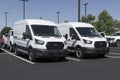 Ford Transit display at a dealership. Ford offers the Transit in Cargo, Crew and Passenger models