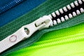 Zip background texture of zippers sliders. a lot of zippers in different colors. sewing clothes, atelier, fabric and accessories s