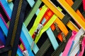 Zip background texture of zippers sliders. a lot of zippers in different colors. sewing clothes, atelier, fabric and accessories s