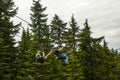 Zip Line riders on Grouse Mountain at Vancouver in British Columbia Royalty Free Stock Photo