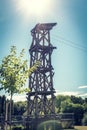 Zip line tower under blue sky and the shining sun Royalty Free Stock Photo