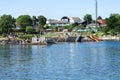 A zip line and a water slide to entertain kids on Vaulen beach in summer, Stavanger