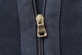 Zipper on the blue jacket. Close up. Selective focus Royalty Free Stock Photo