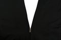 Zipper opening black jacket over white background Royalty Free Stock Photo