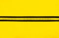 Zipper on the yellow cloth background Royalty Free Stock Photo