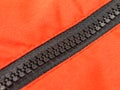 A zipper, zip, fly, zip fastener, formerly known as a clasp locker, is a commonly used device for binding the edges of an opening Royalty Free Stock Photo