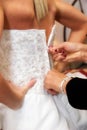 Zipping up brides dress Royalty Free Stock Photo