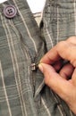 Zipping up the pants Royalty Free Stock Photo