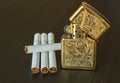 Zippo lighter and cigarettes Royalty Free Stock Photo