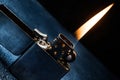 Zippo lighter closeup with flame Royalty Free Stock Photo