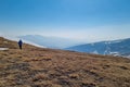 Zirbitzkogel - Man hiking on snow covered alpine pasture and ridges near Zirbitzkogel, Seetal Alps, Styria, Austria, Europe.