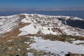 Zirbitzkogel - Woman hiking on snow covered alpine pasture and ridges near Zirbitzkogel, Seetal Alps, Styria, Austria, Europe.