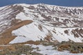 Zirbitzkogel - Woman hiking on snow covered alpine pasture and ridges near Zirbitzkogel, Seetal Alps, Styria, Austria, Europe.