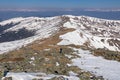 Zirbitzkogel - Woman hiking on snow covered alpine pasture and ridges near Zirbitzkogel, Seetal Alps, Styria, Austria, Europe.