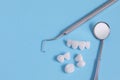 Zircon dentures Surrounded by dental instruments - Ceramic veneers - lumineers