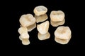 Zirconium tooth crown macro. Isolate on a black background. Aesthetic restoration of tooth loss