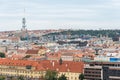 Zizkov television tower and above view at the cityscape of Prague on a sunny day. Royalty Free Stock Photo