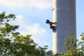 Zizkov Television Tower is a transmitter tower built in Prague between 1985 and 1992 with sculptures of babies crawling Royalty Free Stock Photo