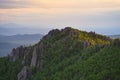 Evening clouds over the mountain rocks of Taganay Royalty Free Stock Photo