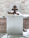 Zlatoust, Chelyabinsk region, Russia, January, 19, 2020. Memorial cross at the wall of the bell tower in Zlatoust on Red hill in w