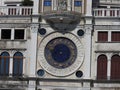 Zodiac clock. Clock Tower with winged lion and two moors striking the bell - early Renaissance 1497 building in Venice, located