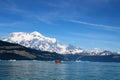 Zodiac Cruising in Icy Bay with Mount Saint Elias in the background, Alaska Royalty Free Stock Photo