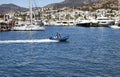 Zodiac passes by and goes into Bodrum marina.