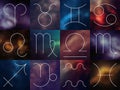 Zodiac signs. White thin line astrological symbols on blurry colorful background.