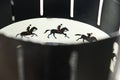 A zoetrope is film animation devices that produce the illusion of motion by displaying motion of drawings. Illustrative photo