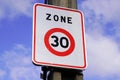 Zone 30 french city road car sign to limit town center vehicle speed to 30km per hour