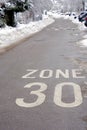 Zone 30 km per hour reduced speed in village Urdorf in Switzerland in winter.