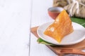 Zongzi - alkaline Chinese rice dumpling crystal food on a plate to eat for traditional Dragon Boat Duanwu Festival concept, close