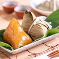 Zongzi - Alkaline rice dumpling - Traditional sweet Chinese crystal food on a plate to eat for Dragon Boat Duanwu Festival Royalty Free Stock Photo