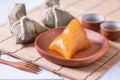 Zongzi - Alkaline rice dumpling - Traditional sweet Chinese crystal food on a plate to eat for Dragon Boat Duanwu Festival Royalty Free Stock Photo