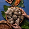 Zongzi - Dragon Boat Festival concept Rice dumpling, traditional Chinese food on blue wooden background for Duanwu Festival, top