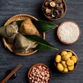 Zongzi. Rice dumpling top view for Dragon Boat Festival over dark black background