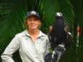 Zoo keeper holding a Wedge Tailed Eagle on her arm