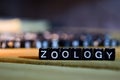 ZOOLOGY concept wooden blocks on the table.