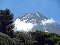 Zoom in backlighting shot of beautiful volcano summit of Mount Taranaki, New Zealand Royalty Free Stock Photo