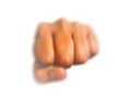 Zoom blur action photography of Left hand Punching Fist isolated on white background. Royalty Free Stock Photo
