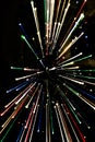 Zoom effect photo of christmas colorful lights dynamic focus motion on black background. Royalty Free Stock Photo