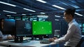 Zoom in of expert in data center using artificial intelligence on mockup PC