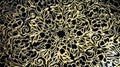 Zoom of golden acrylic pattern