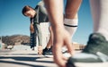 Zoom of hands, woman stretching legs or runner shoes with friends for running exercise, fitness or marathon workout Royalty Free Stock Photo