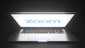ZOOM logo on the display of a portable computer, editorial conceptual 3d rendering